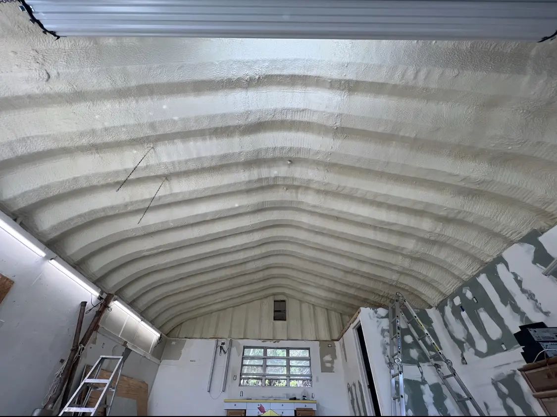 Spray polyurethane foam applied to the underside of a metal roof deck in Aberdeen
